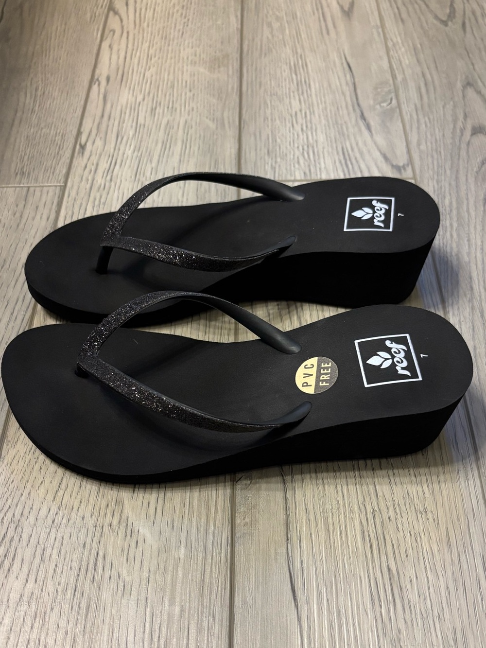 Reef Black Sparkle Wedge Flip Flops
